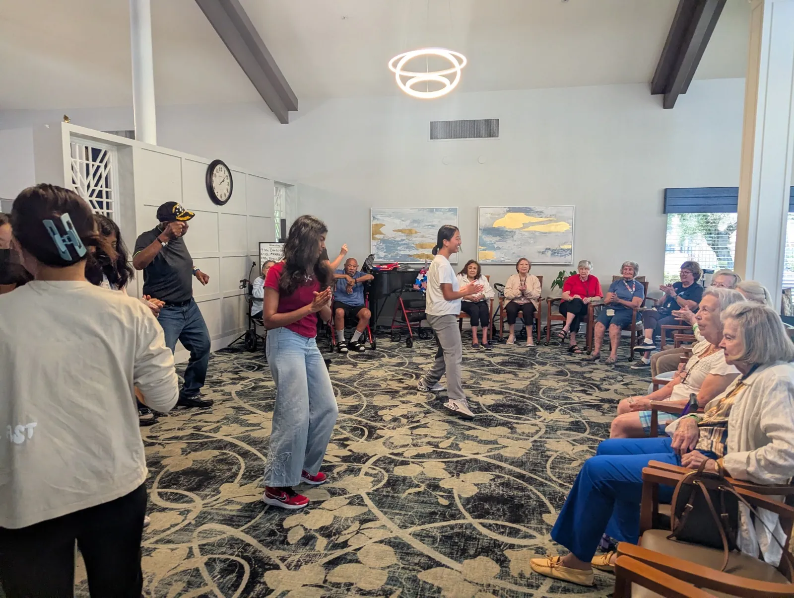 Volunteers and seniors sharing an activity in California